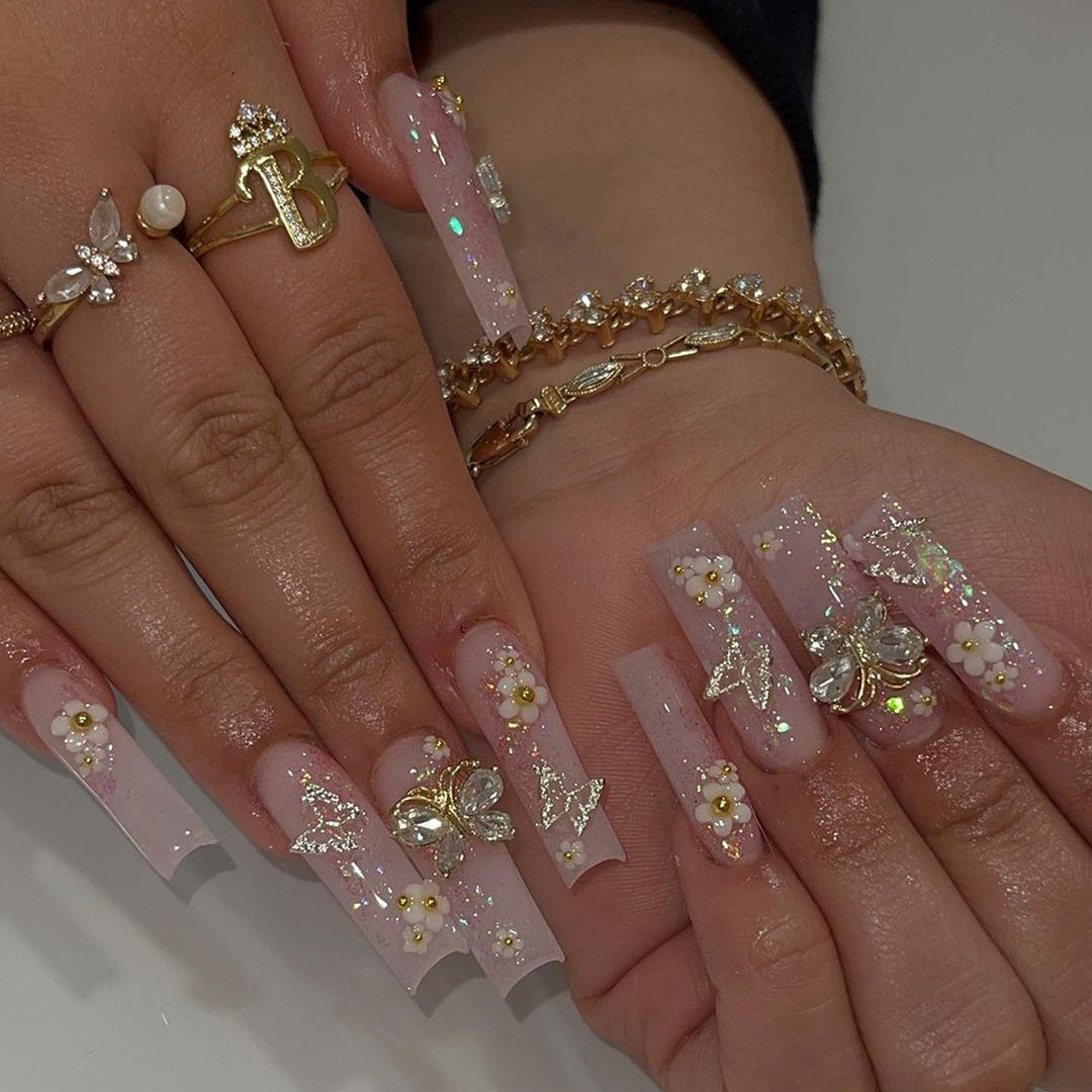 Glamorous artificial nail set with sparkling rhinestones and cross decorations Kalsten