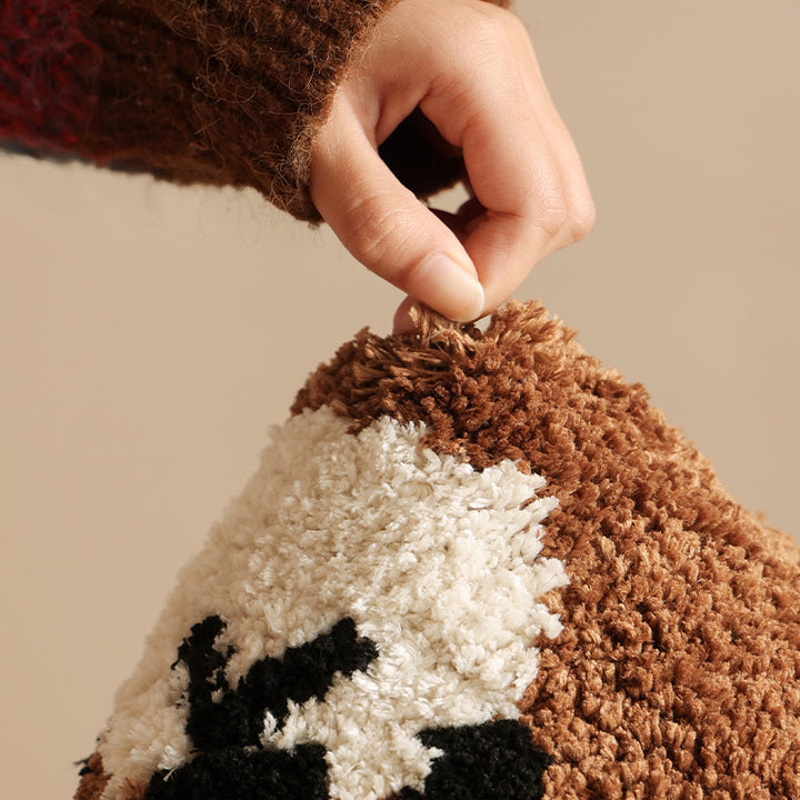 Shaped high pile bath mat with gift bear motif and non-slip backing