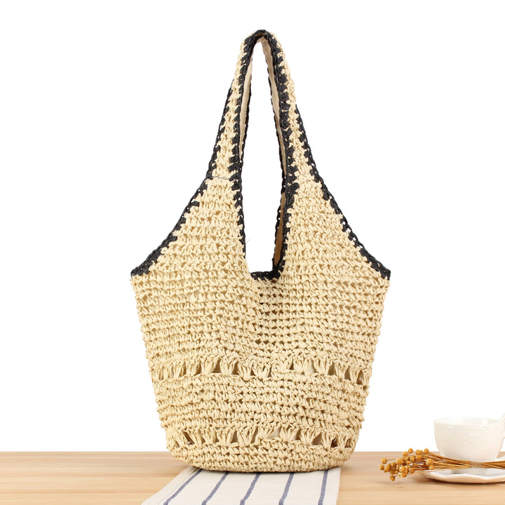 Beach shoulder bag made of handwoven natural material with comfortable carrying handles Kalsten