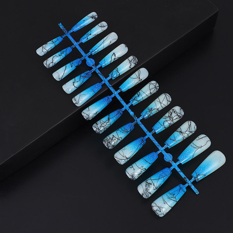Artificial nails in modern ombre design with marbled accents Kalsten
