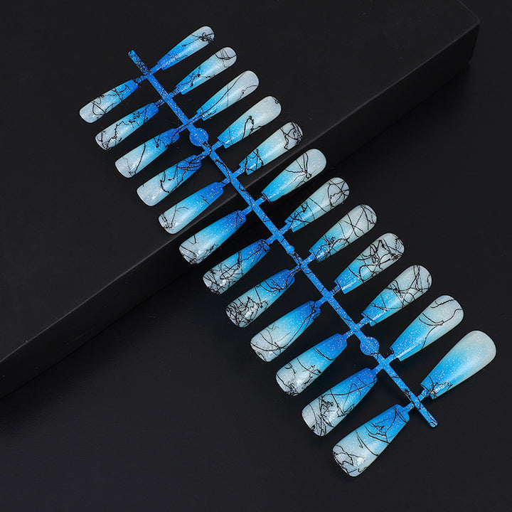 Artificial nails in modern ombre design with marbled accents Kalsten