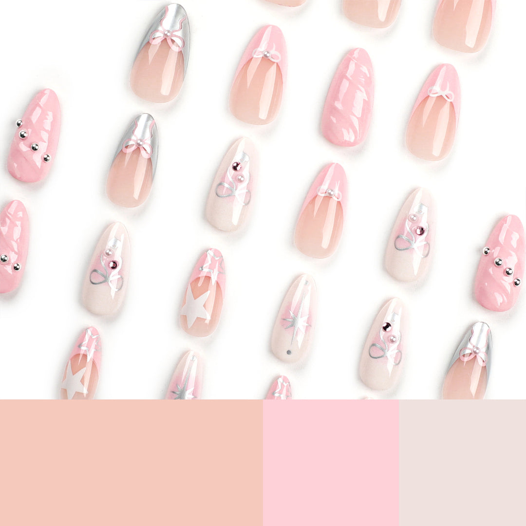 Artistic Nail Art with decorative bows and glitter accents Kalsten