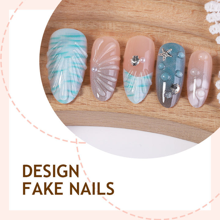 Artificial nail set with elegant shell pattern and 3D accents Kalsten