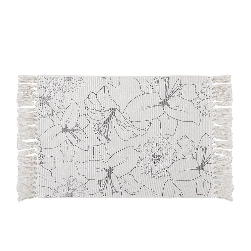 Woven table runner with botanical bird print and decorative fringes
