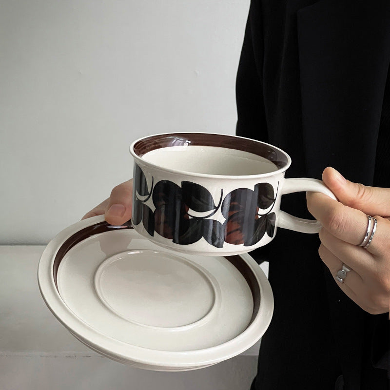 Ceramic cup set with saucer and modern floral print