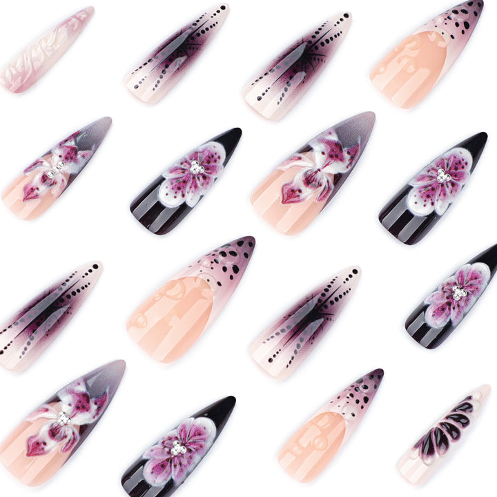 Artistic stiletto nails with floral 3D embellishments Kalsten