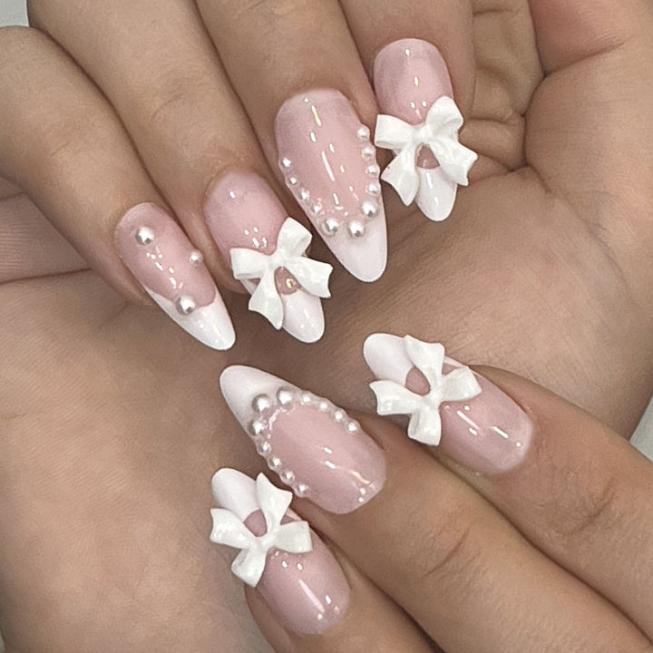 Decorative Press-On Nail Art with Bow Accents
