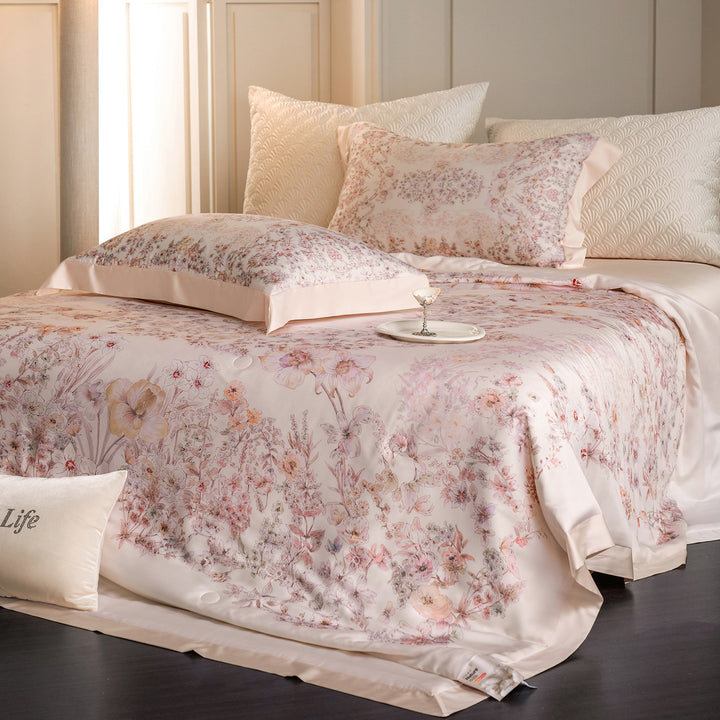 Luxurious cotton satin bed linen set with delicate floral print and quilted bedspread
