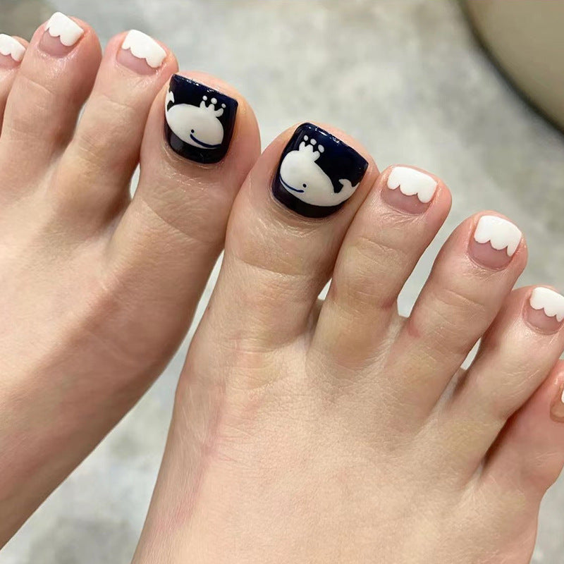 Artful toenail art with a moody whale motif Kalsten