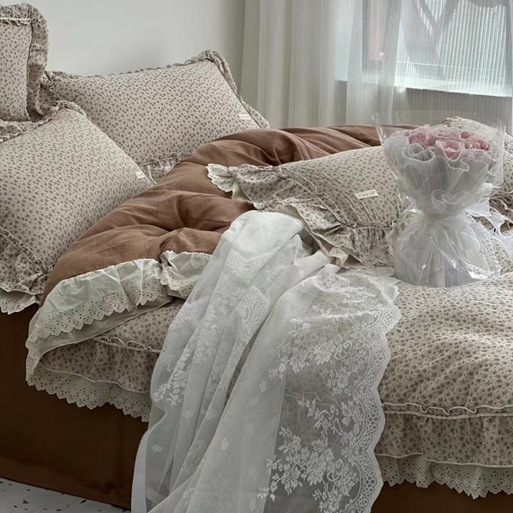 Duvet and pillowcase set made of cotton cambric with ruffles and eyelet embroidery