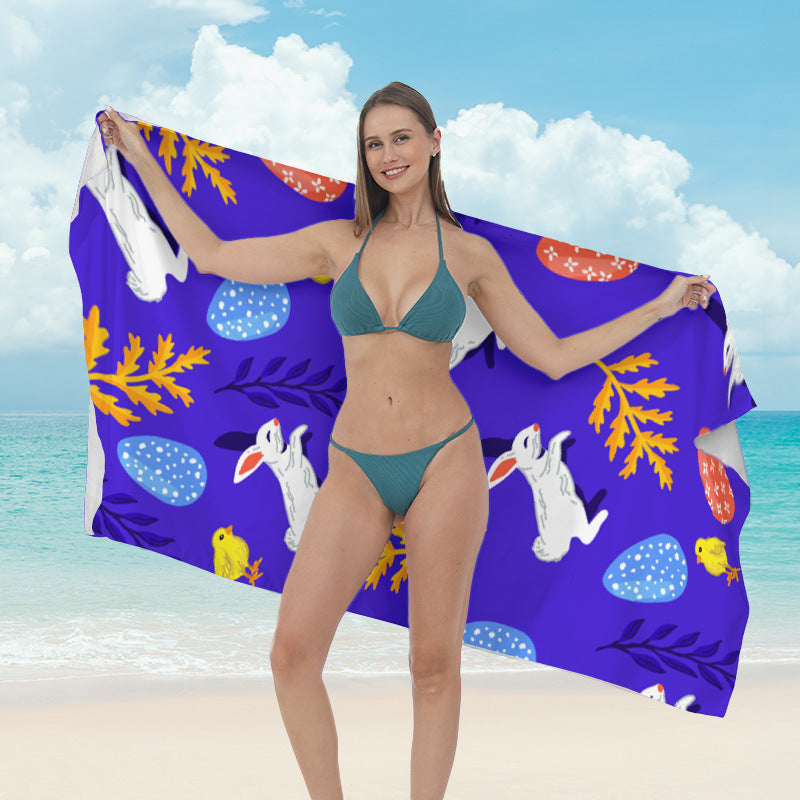 Beach towel with vibrant tropical plant motif Kalsten