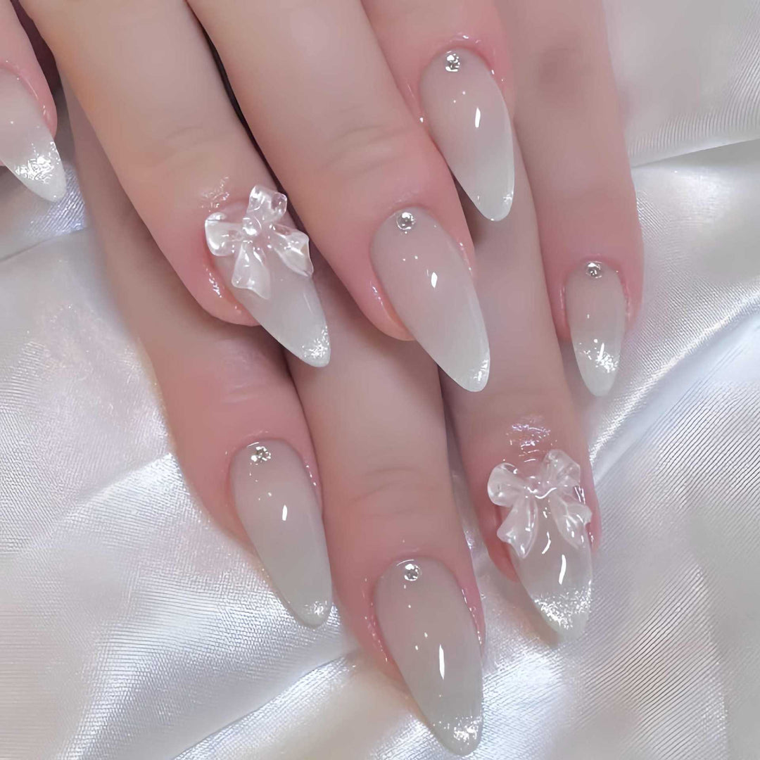 Elegant Stiletto-Shaped Press-On Nails with Decorative Bow Accents Kalsten