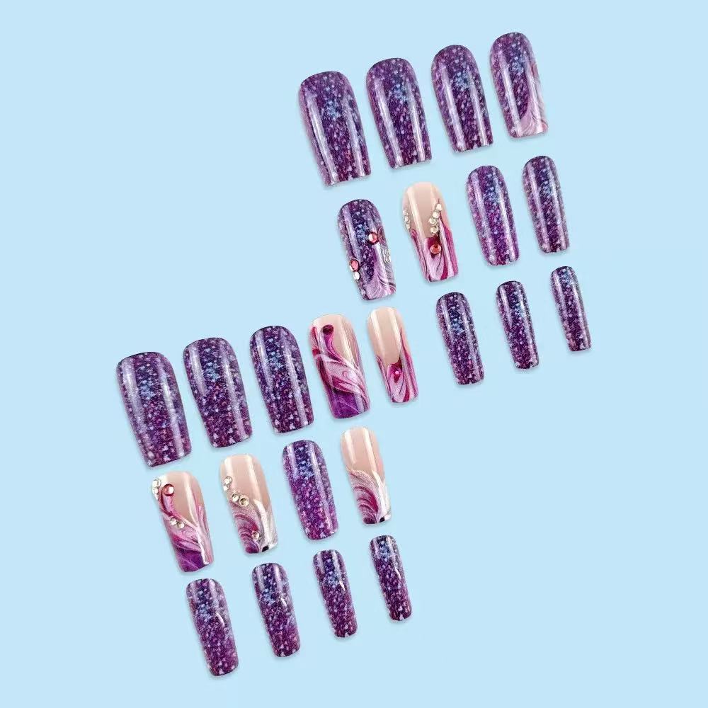 Acrylic nail set with luxurious color gradients and sparkling accents Kalsten