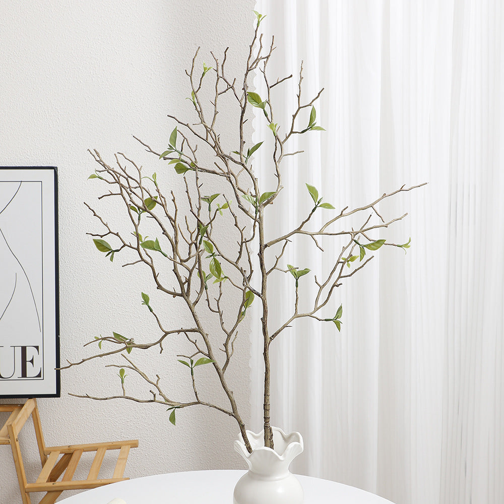 Decorative art branch with natural leaves