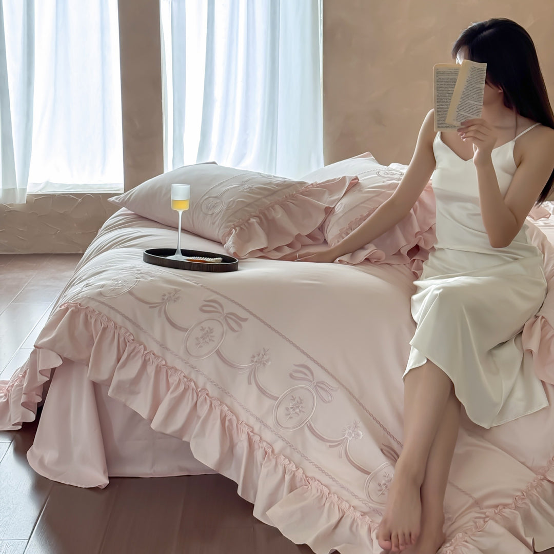 Luxurious embroidered bedding set with ruffle and pillowcases