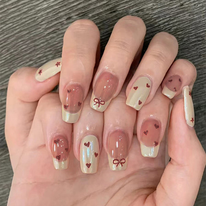 Artifical nails with romantic heart and ribbon designs Kalsten