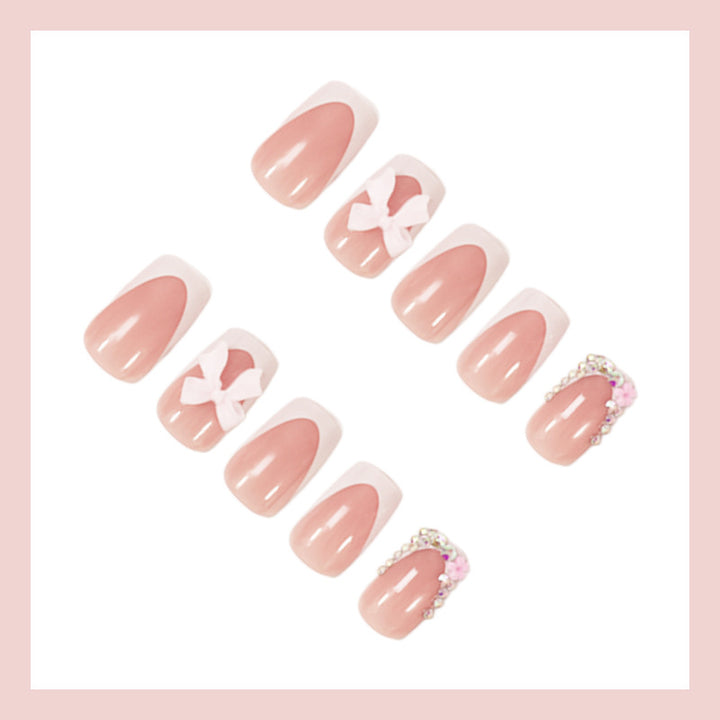 Artificial nail set with elegant bow and glitter designs Kalsten