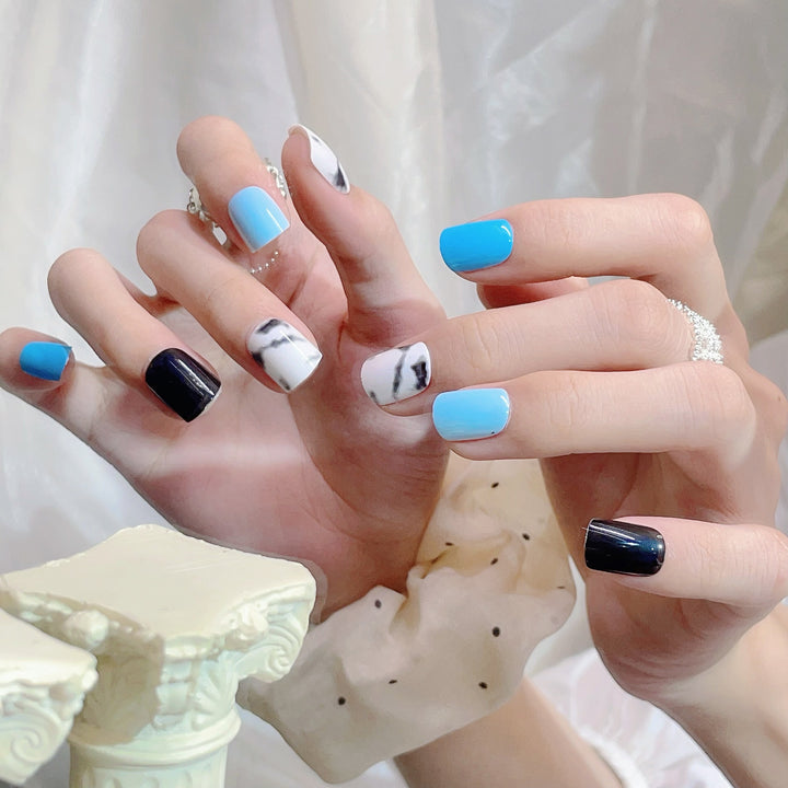 Artistic Press-On Nail Set with Marbled Patterns