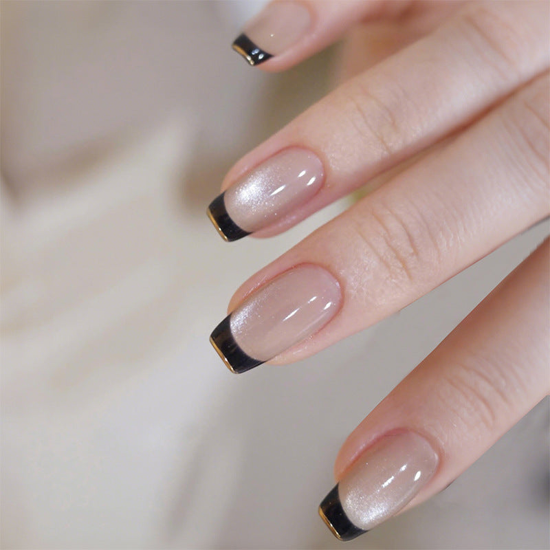 Acrylic nail set with elegant French design and glitter accents Kalsten