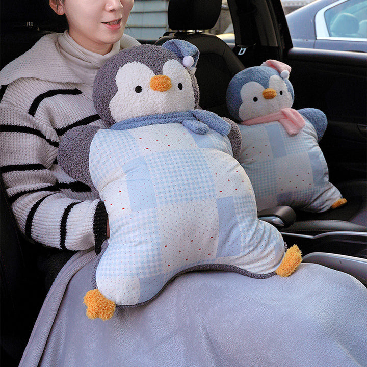 Cozy plush pillow with integrated blanket in penguin look