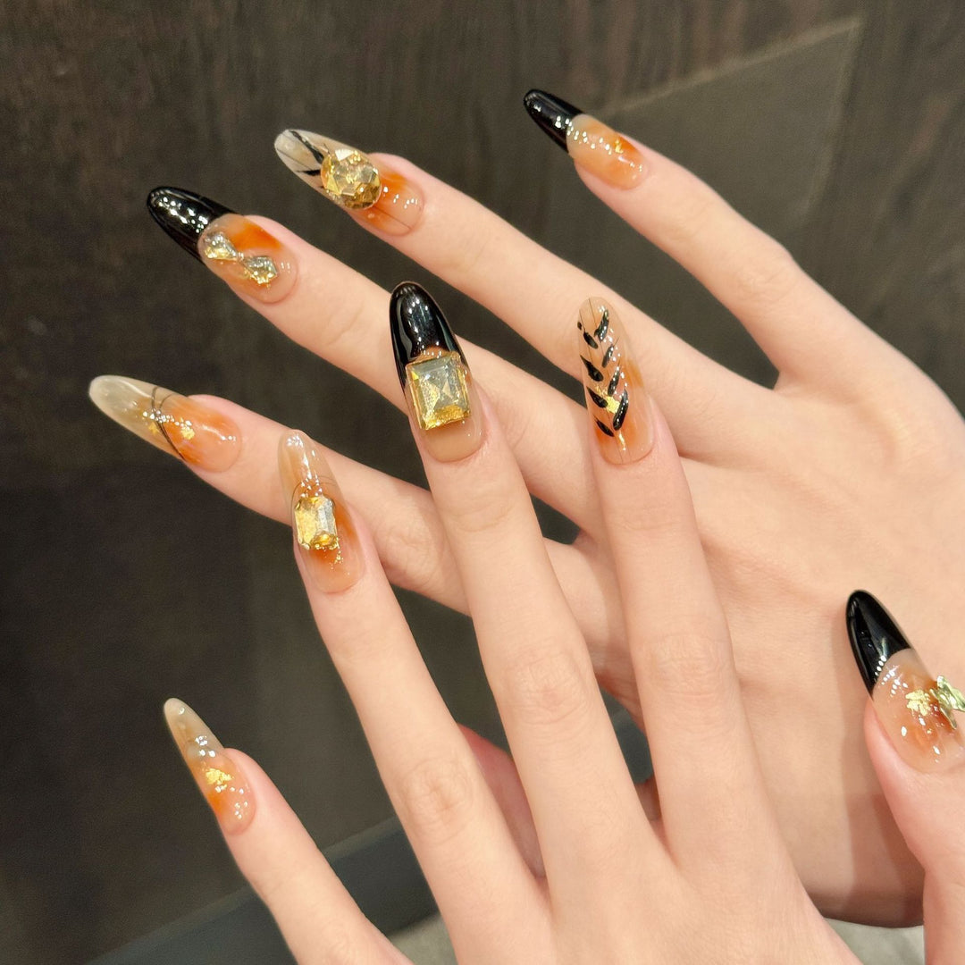 Artistic Gel Press-On Nails with Geometric and Gem Accents