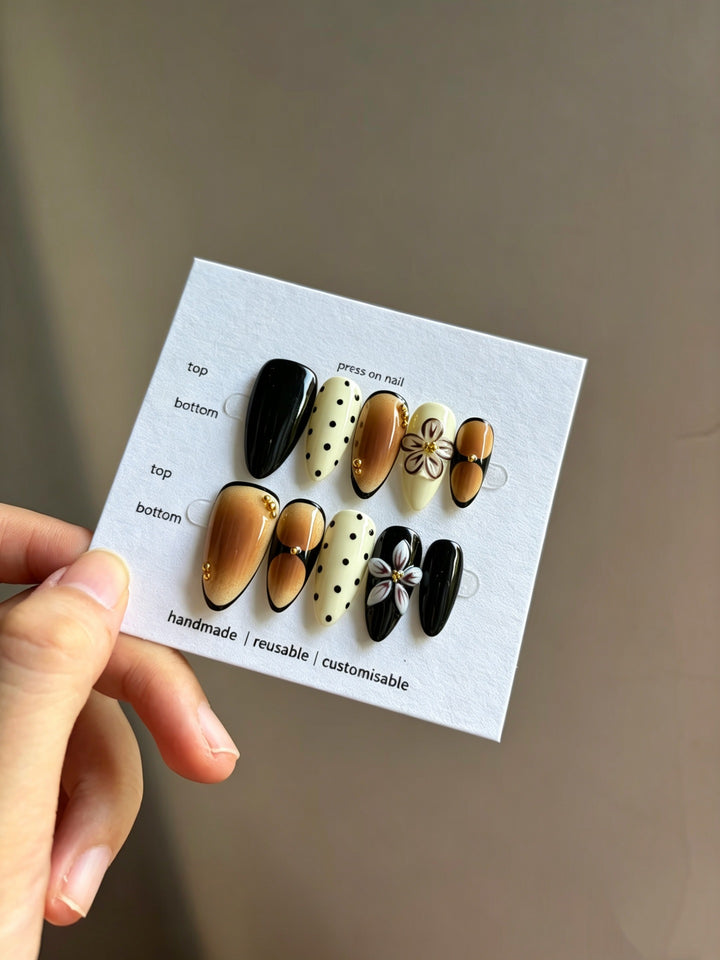 Artistic Press-On Nail Set with Reusable Floral and Polka Dot Designs