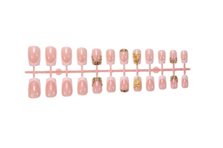Nail art set with elegant glitter ornaments and stylish French tips Kalsten