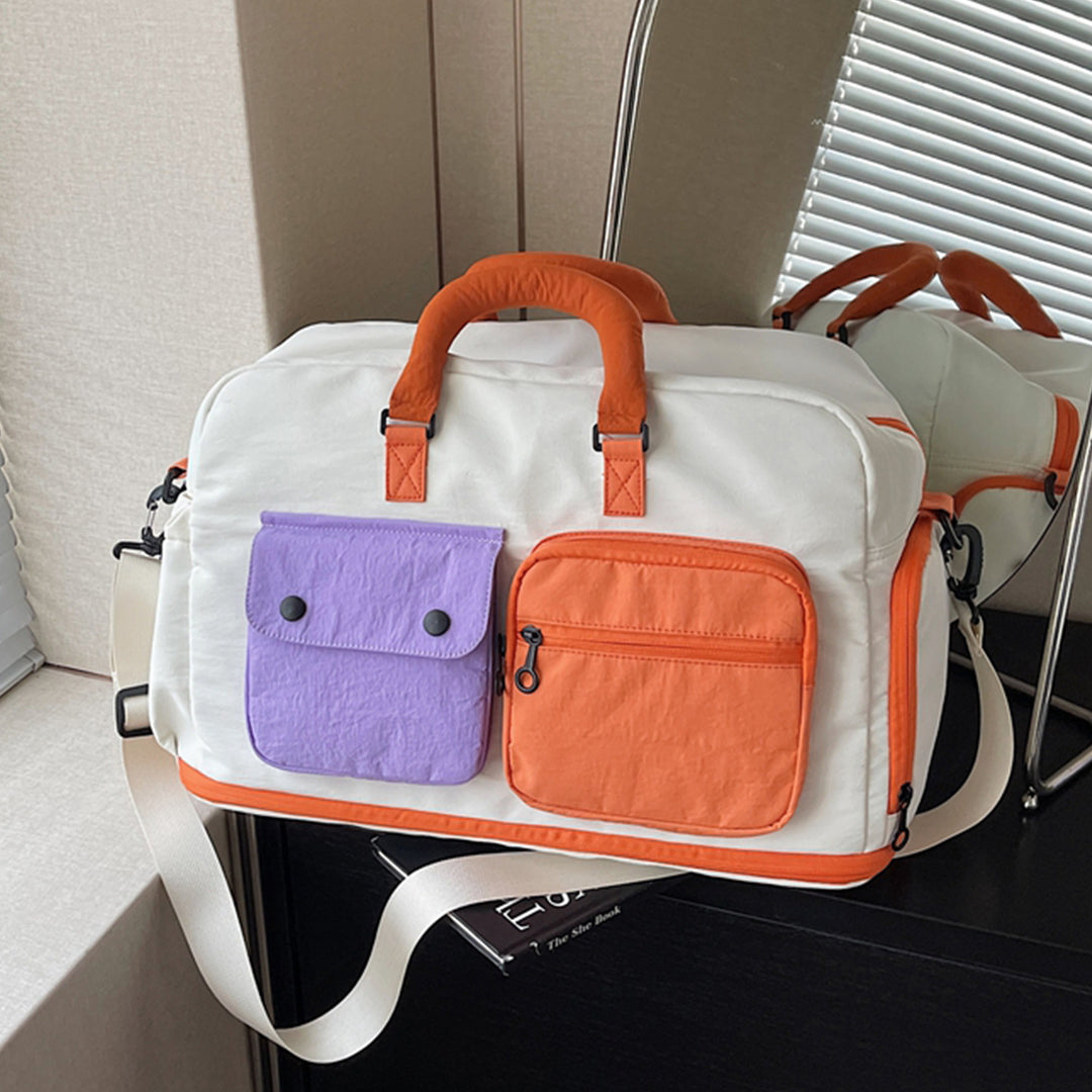 Sporty travel bag with multifunctional outer pockets Kalsten