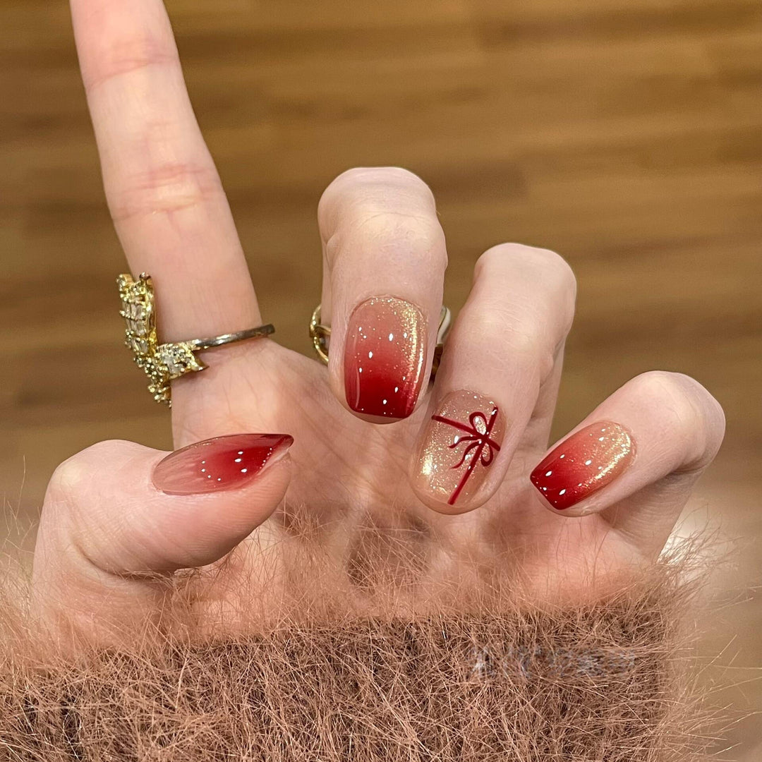 Artificial nails with festive gradient color and elegant decorations Kalsten