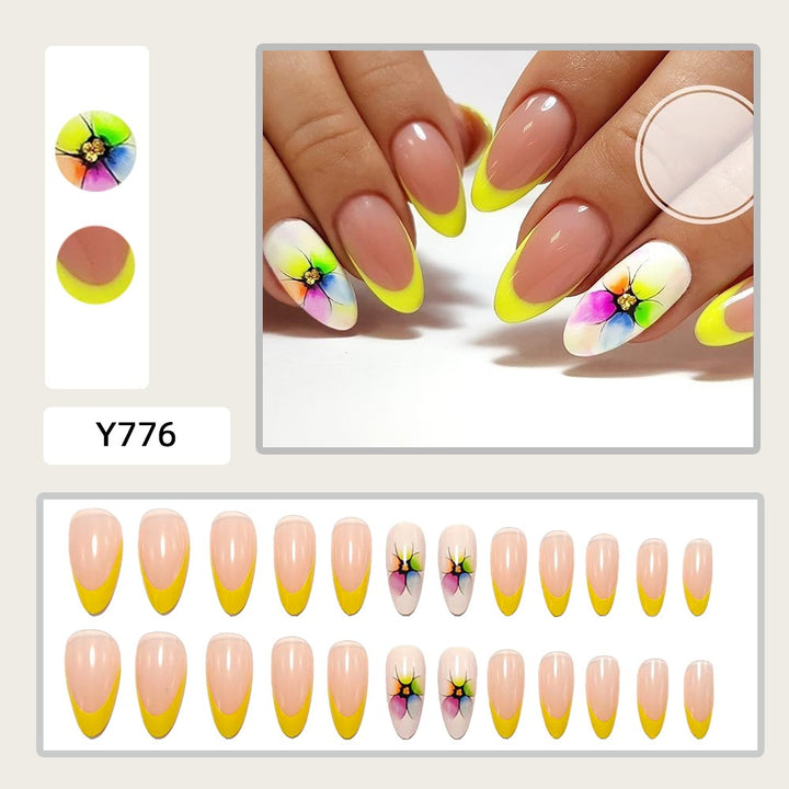 Artificial nails with colorful floral designs and striking color accents Kalsten