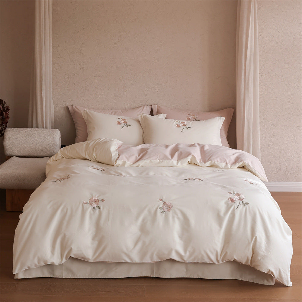 Elegant cotton satin bed cover set with rose embroidery and reversible look