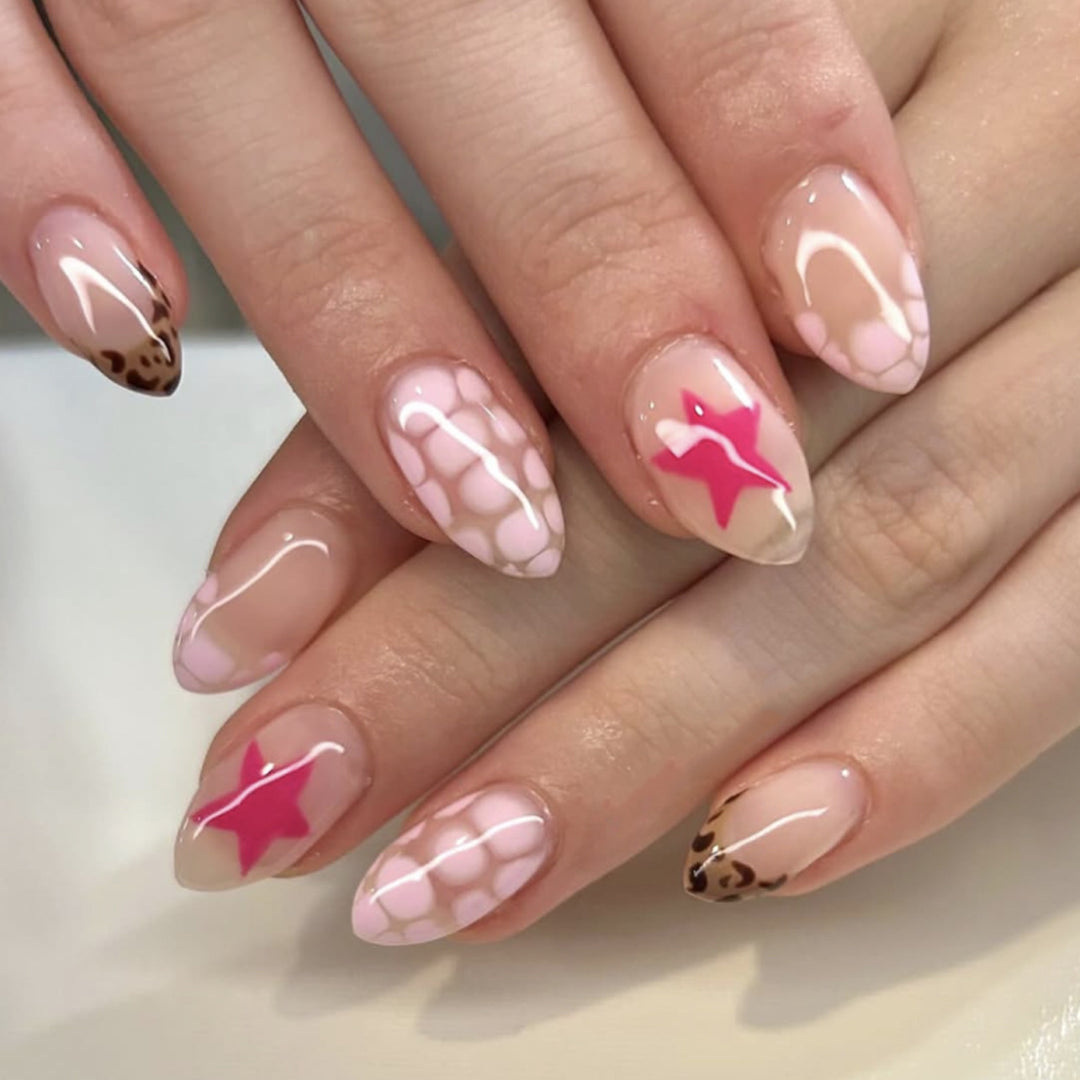 Artificial nail art with playful dots and bows Kalsten