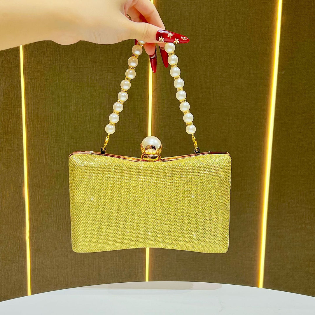 rhinestone-embellished evening clutch