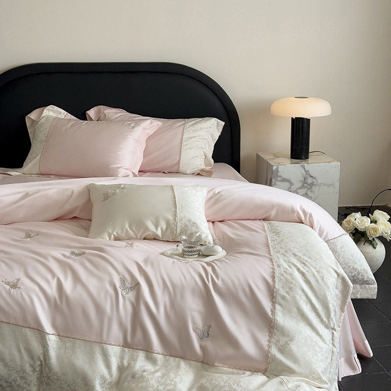 Luxurious cotton satin bedding set with butterfly embroidery and tie band pillow