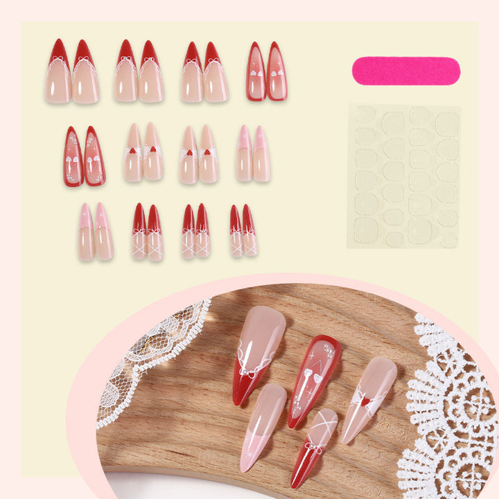 Artificial nail set with romantic heart and bow motifs Kalsten