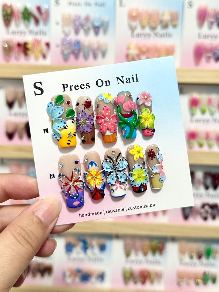 Artistic Press-On Nail Art Set with Vibrant Flower and Butterfly Designs