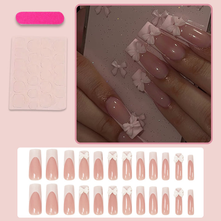 Artificial nail set with shimmering details and cute bows Kalsten
