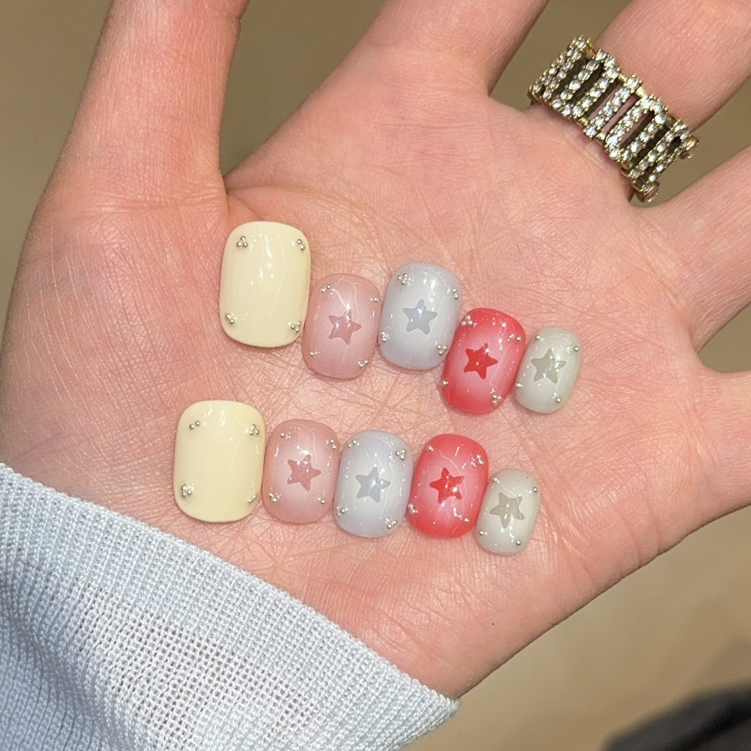 Artificial nails with sparkling star motifs Kalsten