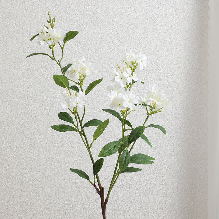 Decorative art branch with white flowers
