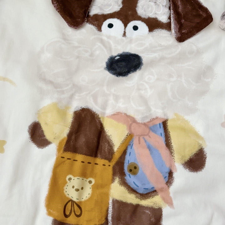 Children's bedding set with detailed dog appliqué, velvet trim, and soft muslin