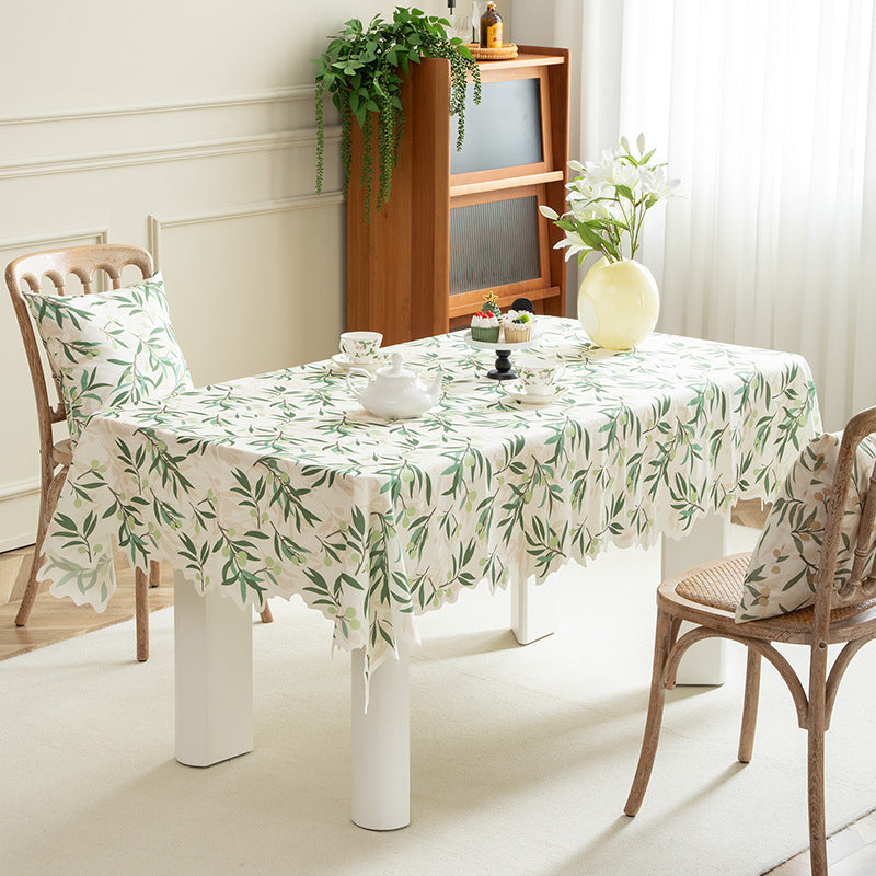 Round wipeable tablecloth with floral cut-out hem Kalsten
