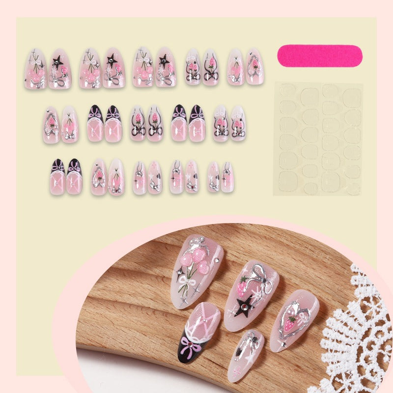 Artificial nail collection with playful bow and glitter details Kalsten