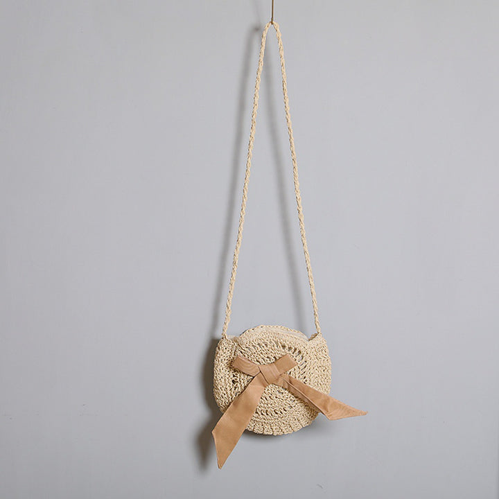 Handwoven shoulder bag with decorative bow accent Kalsten