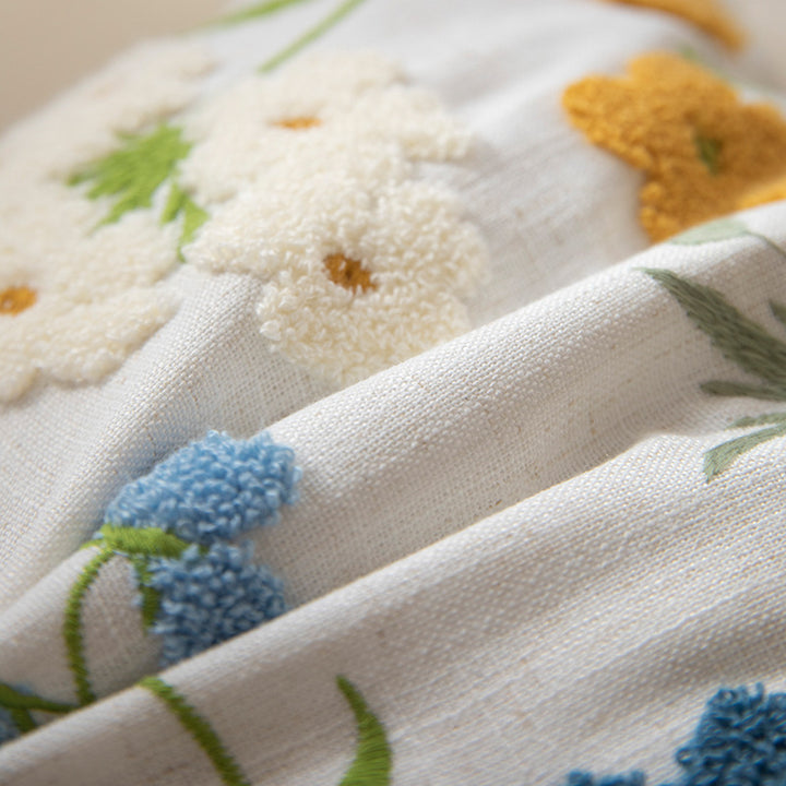 Embroidered linen decorative pillow with botanical flower embroidery