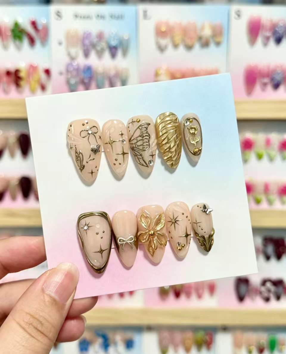 Artistic Press-On Nails Set with Gold and Floral Embellishments