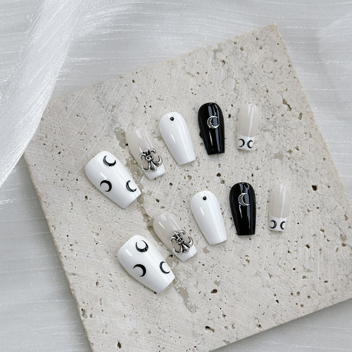 Artistic Press-On Nail Art Set with Elegant Moon and Star Designs
