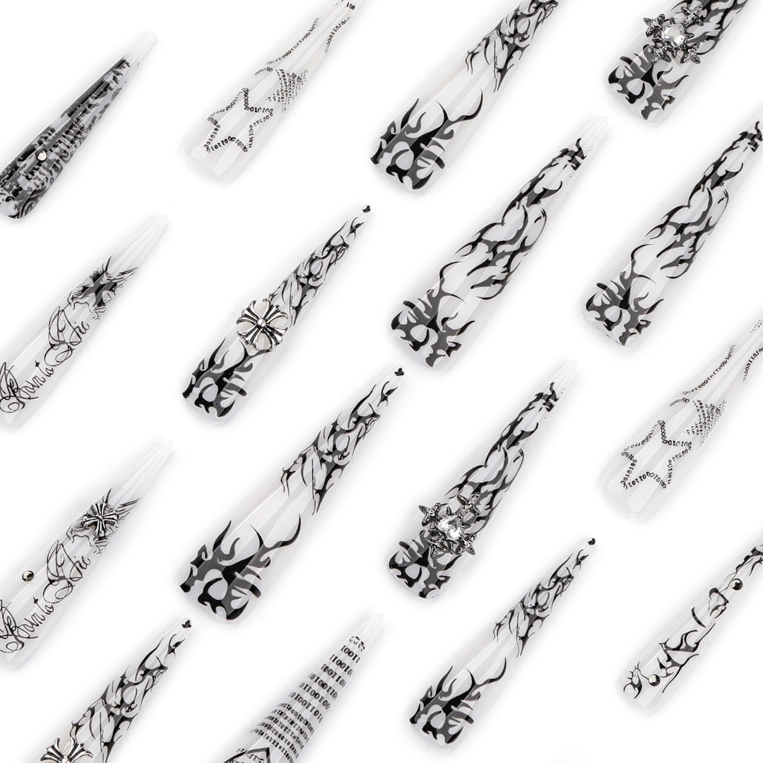 Artful stiletto nails with gothic pattern and embellishments Kalsten