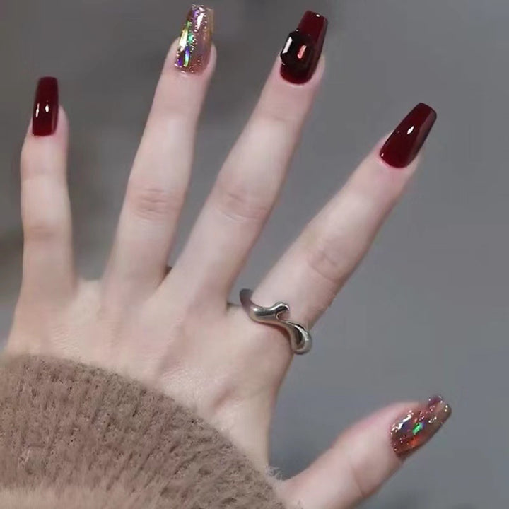 Glamorous artificial nails with crystal elements Kalsten