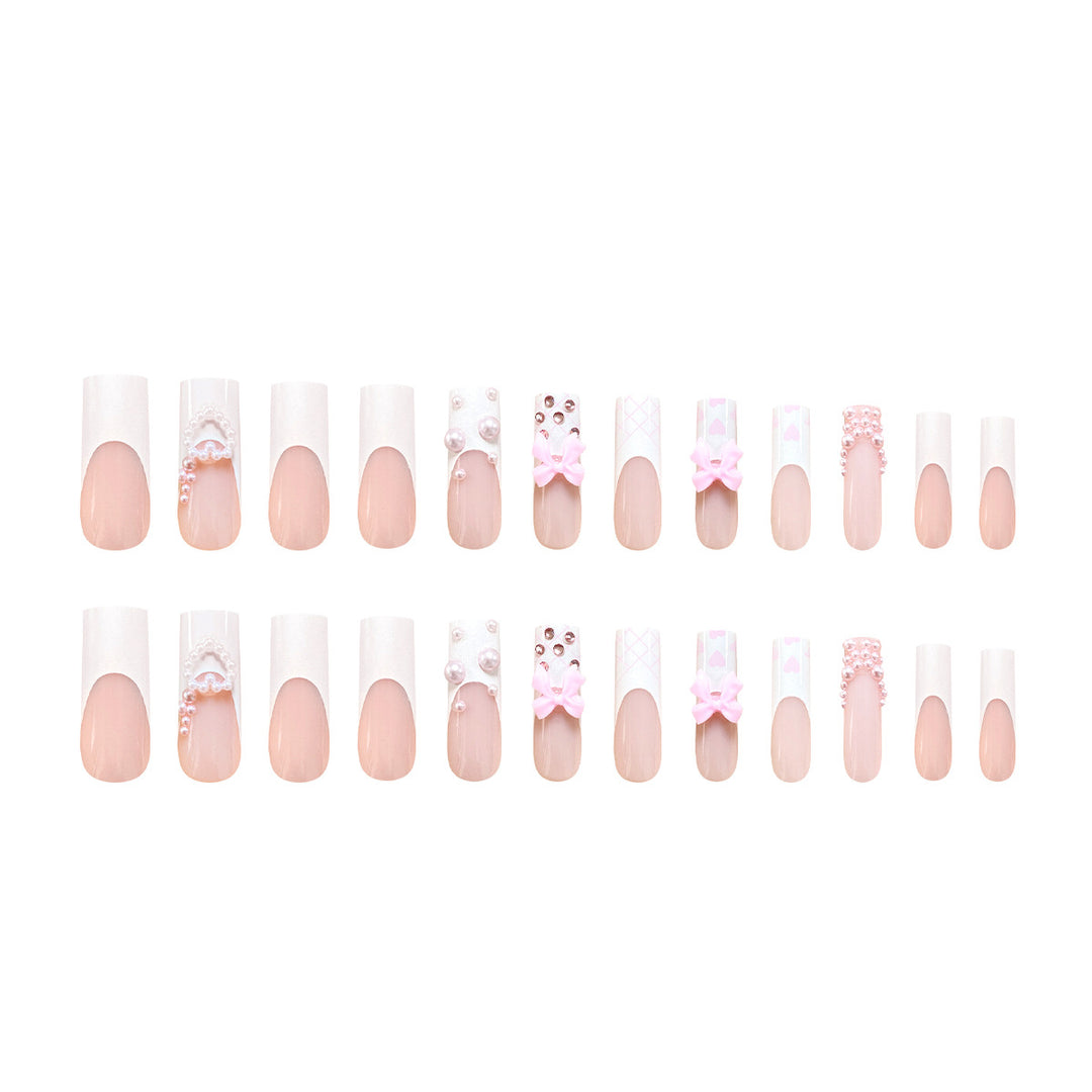 Artistic acrylic nails with bow and pearl decorations Kalsten