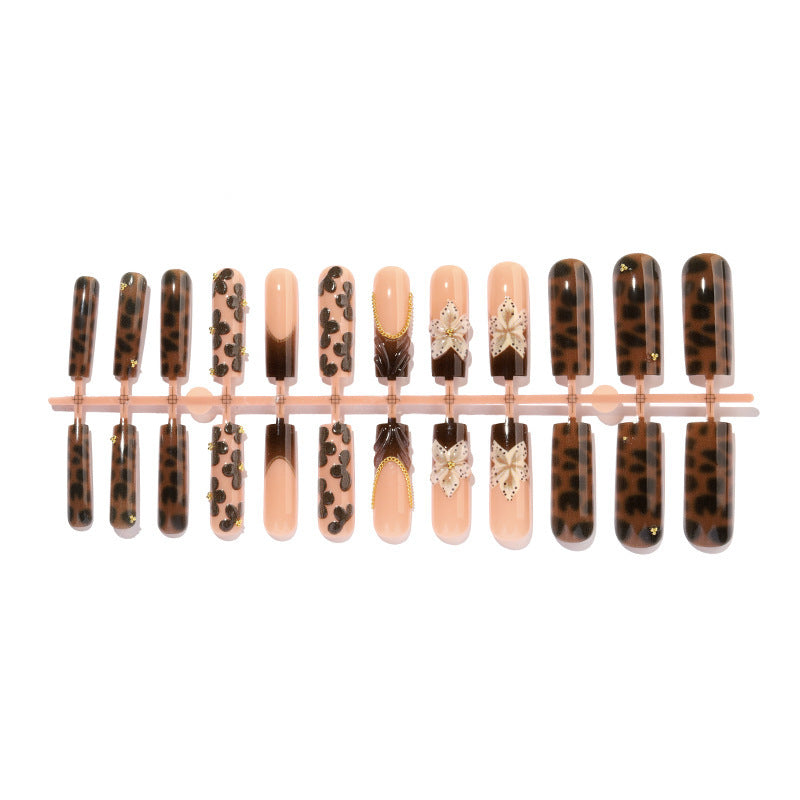 Creative nail art set with glamorous animal motifs and elegant embellishments Kalsten